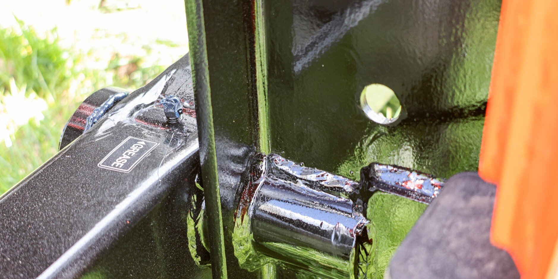 One of the grease points on a FencePro post driver.